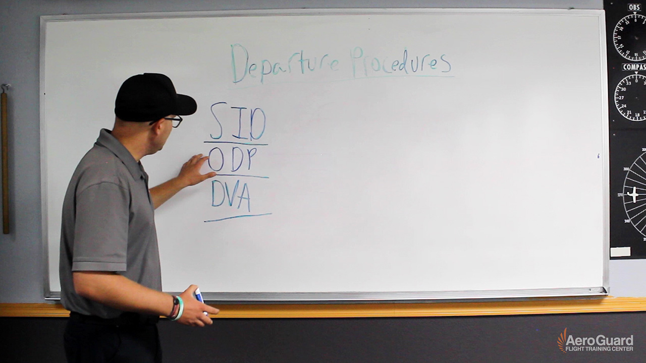 flight instructor teaching IFR departure procedures on whiteboard